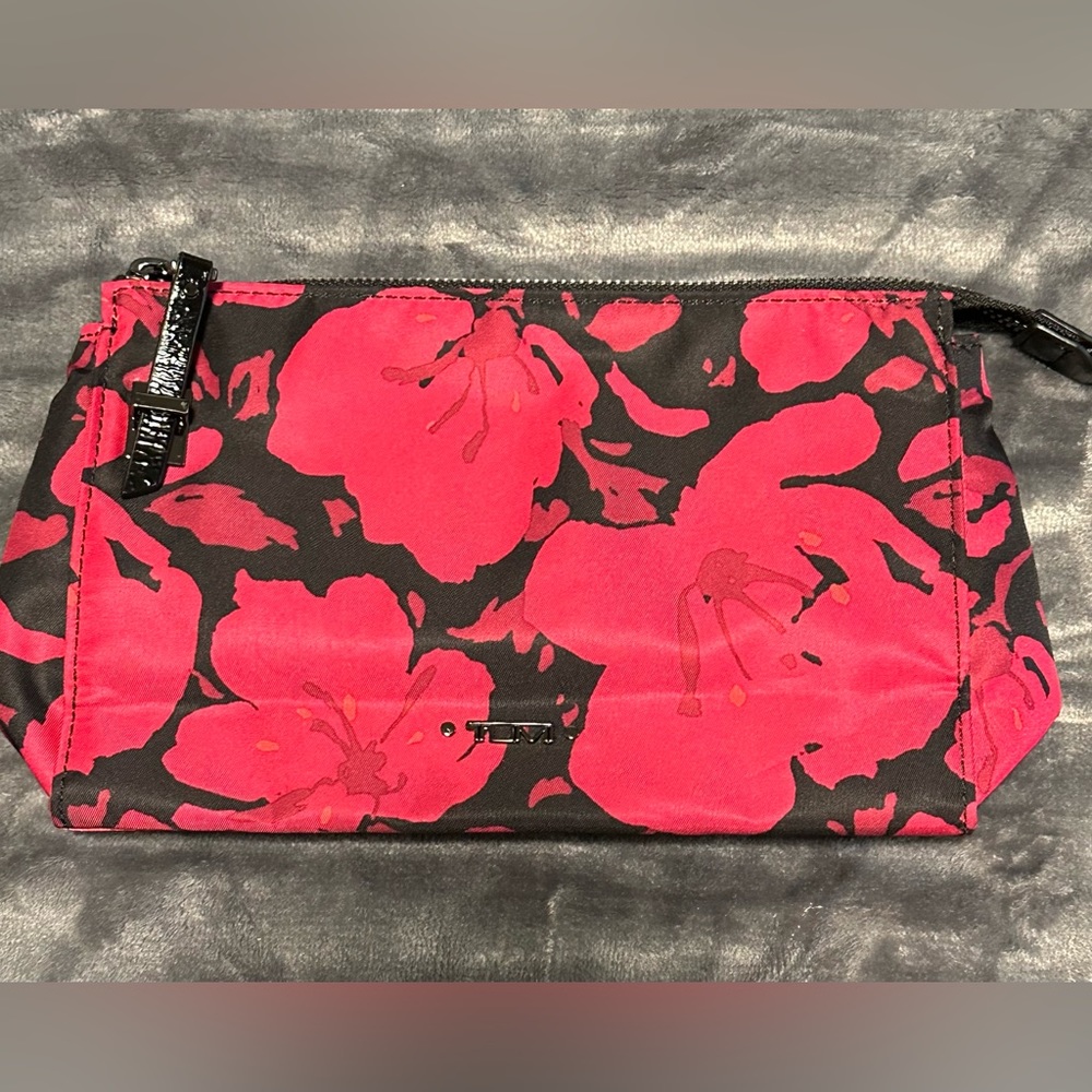 .Tumi small travel bag carried one time